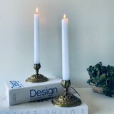 Pair of bronze candle holders signed