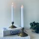 Pair of bronze candle holders signed