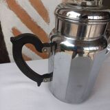 Silver metal coffee maker with glass cap