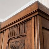 Old solid wood wardrobe with three vintage mirror doors