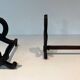 Pair of Cast Iron Chenets with Figurative Anthropomorphic Silhouette, by Raymon