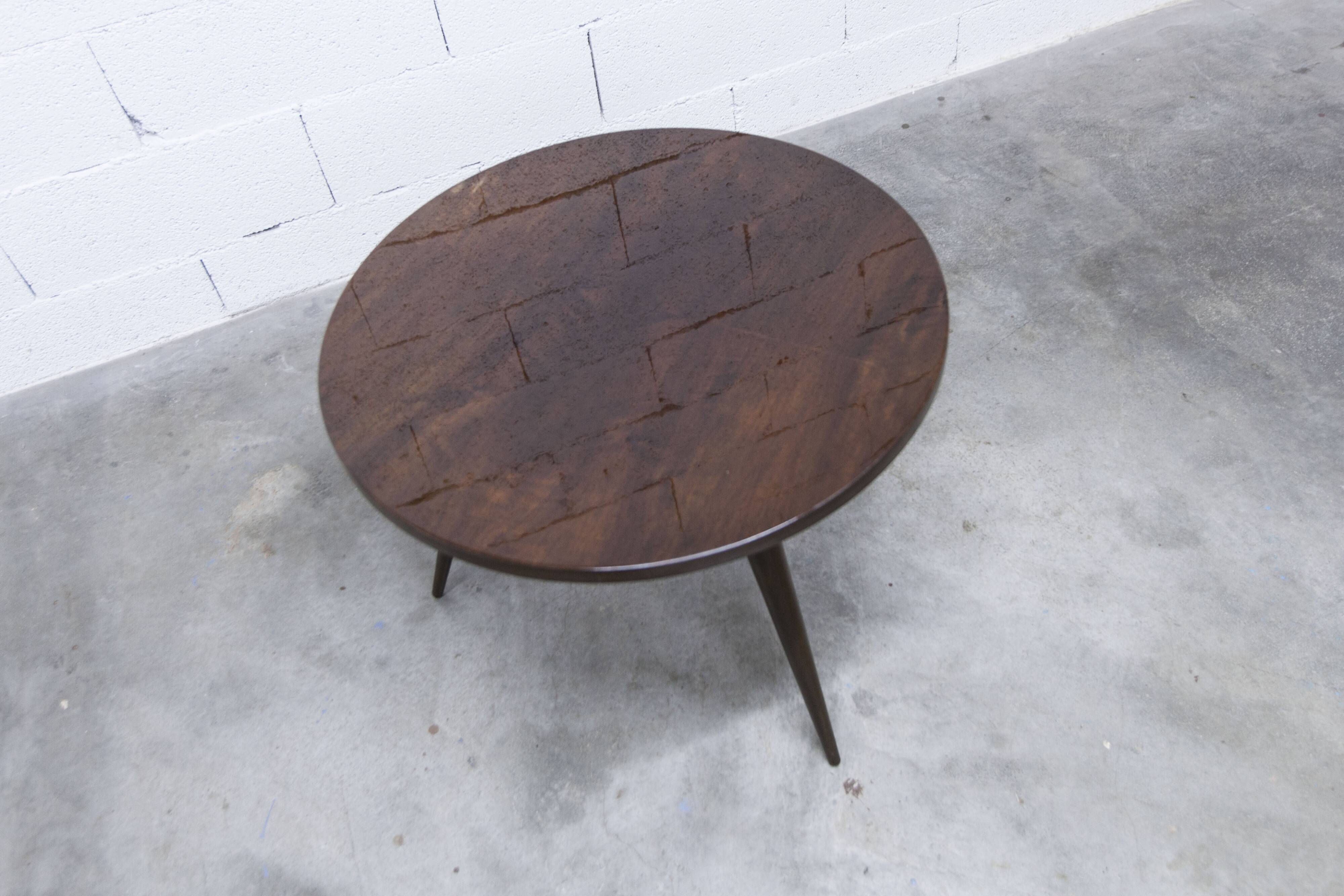 1960s Scandinavian tripod coffee table with glossy varnish in mahogany wood.