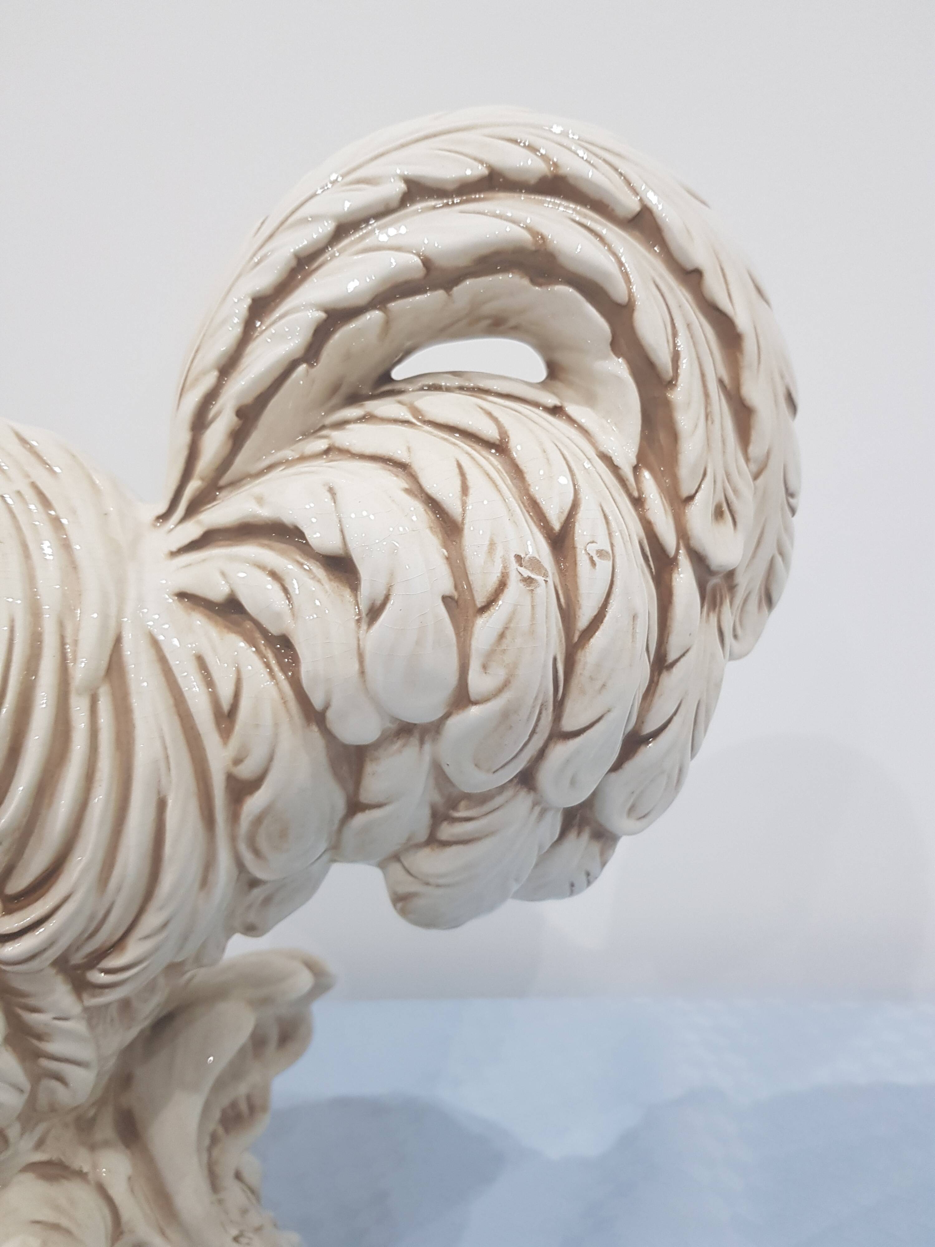 A colorful figurine of a Rooster, Made in Italy