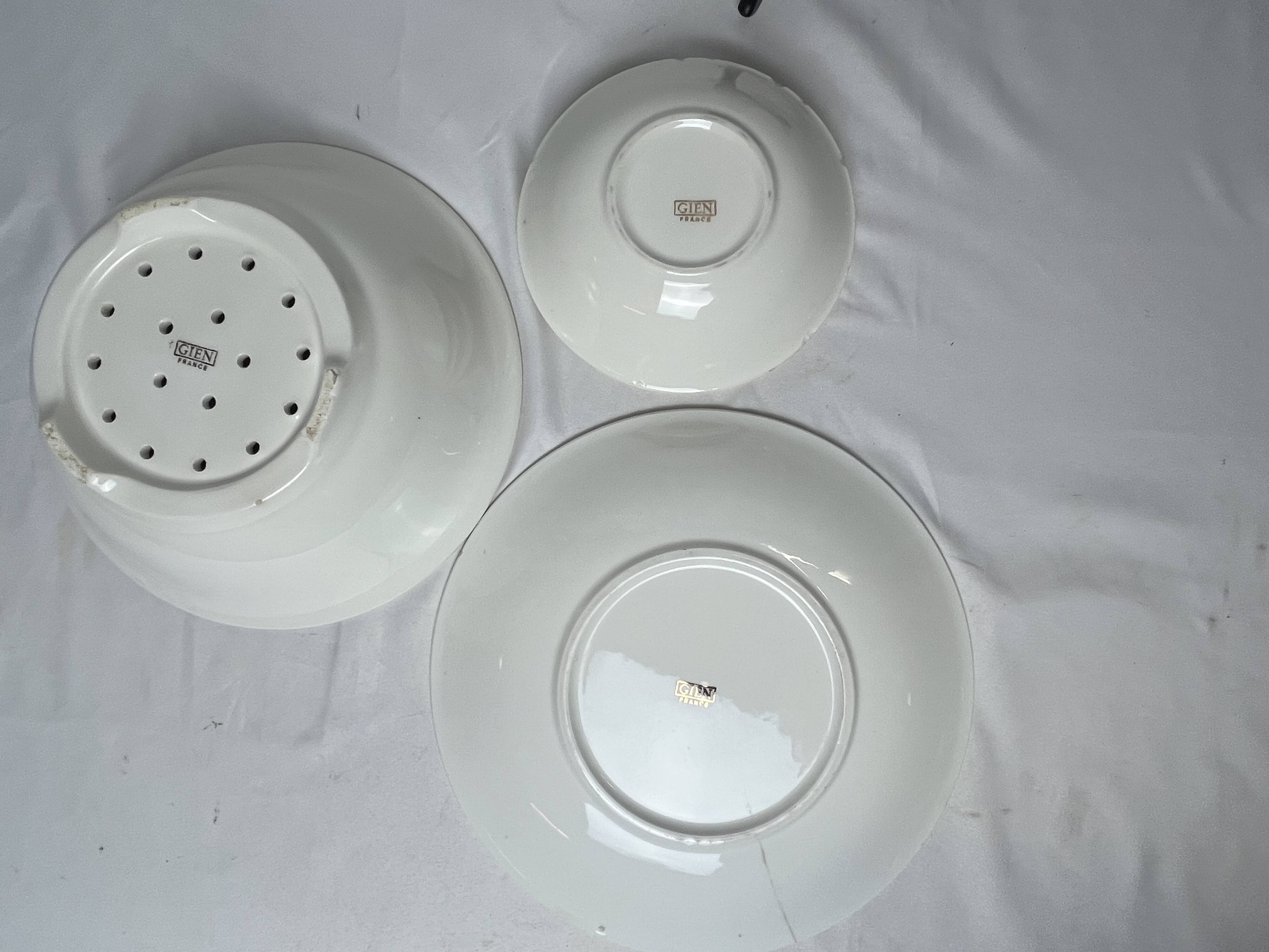 GIEN, strawberry draining bowl and earthenware dishes, 20th century