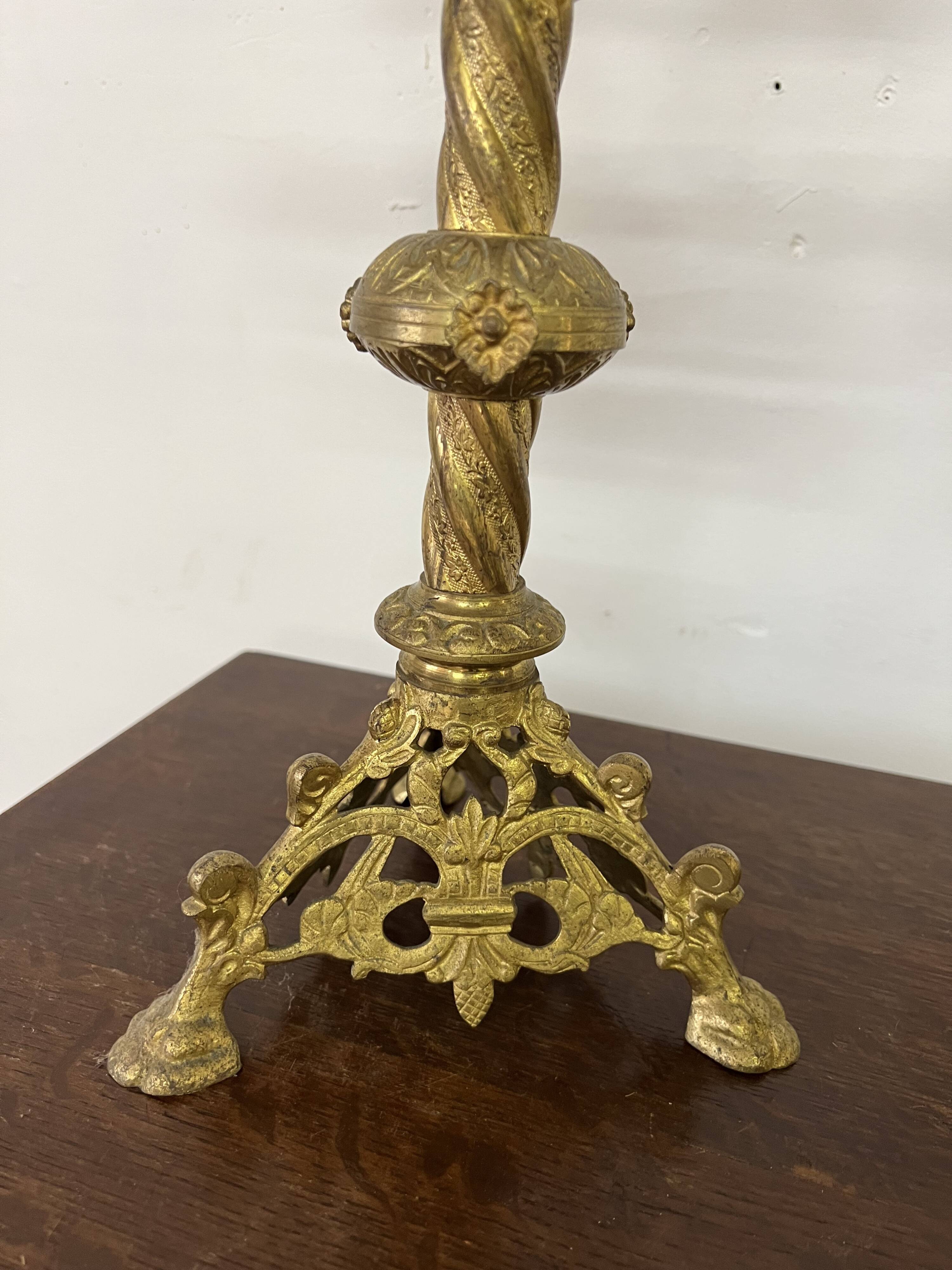 Pair of old altar candelabras in gilded brass from the 19th century