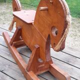 Rocking horse in raw and glazed wood