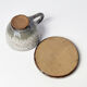 Handcrafted stoneware cup and its saucer – Speckled glaze