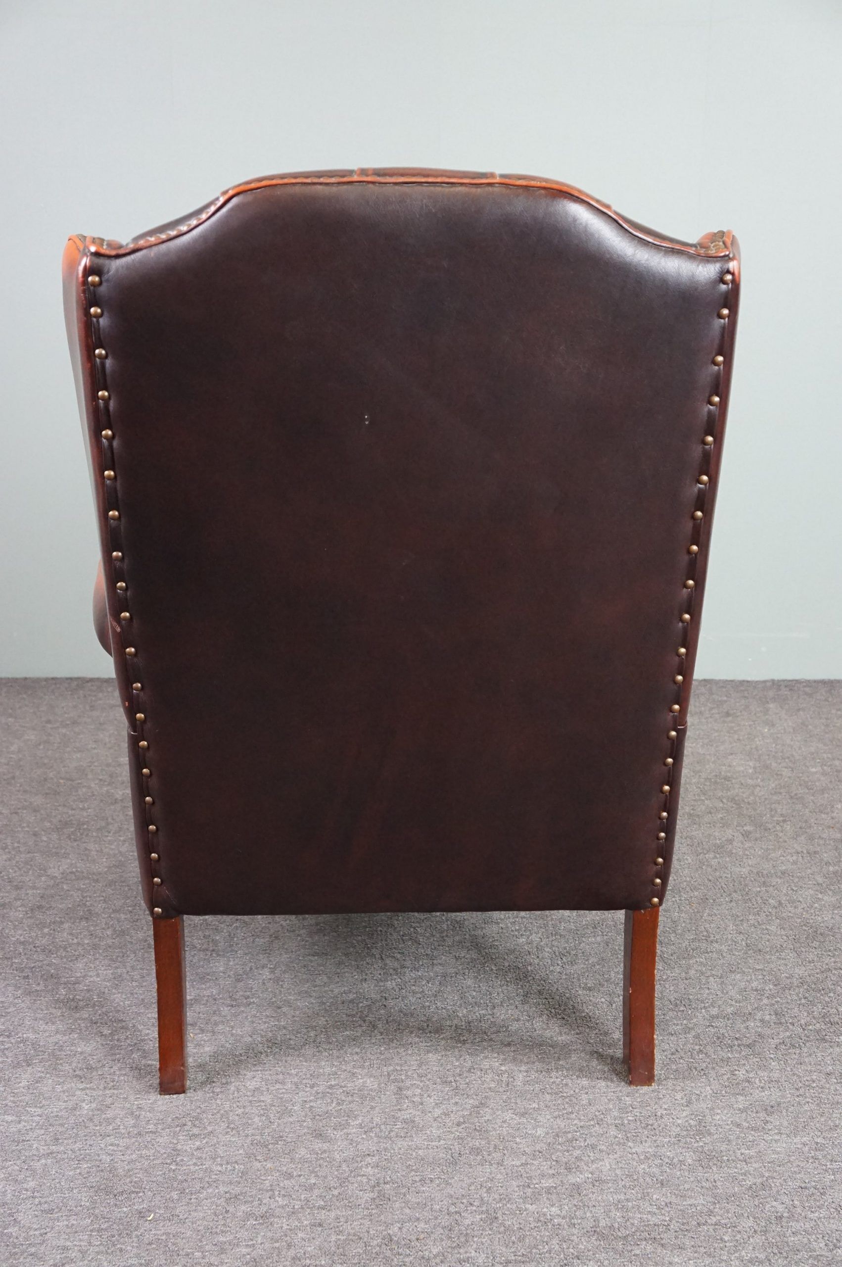 Fauteuil Chesterfield en cuir de vachette