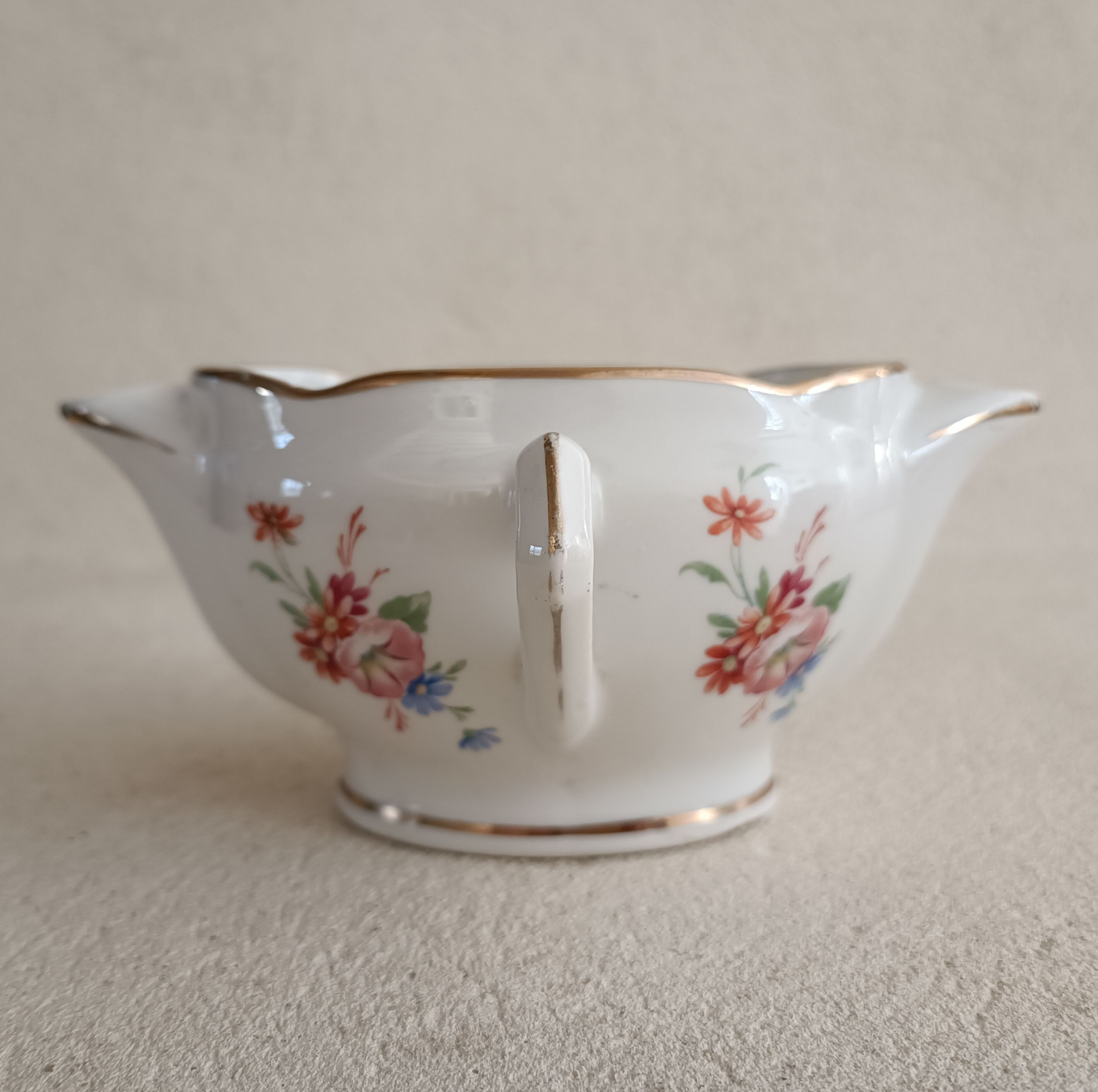 Lean fat sausage in Limoges porcelain