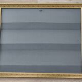 Golden frame with purple floral patterns