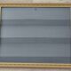 Golden frame with purple floral patterns
