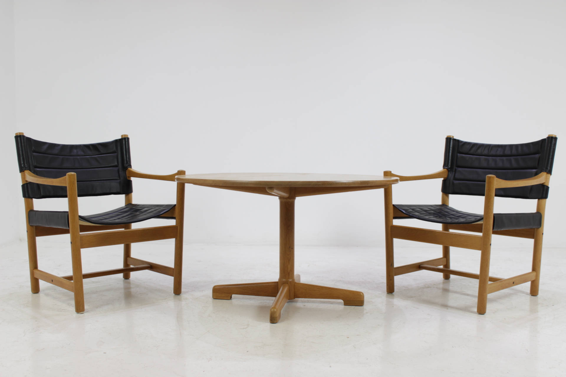 Set of Danish black leather armchairs and coffee table by ditte and adrian heath, 1960s