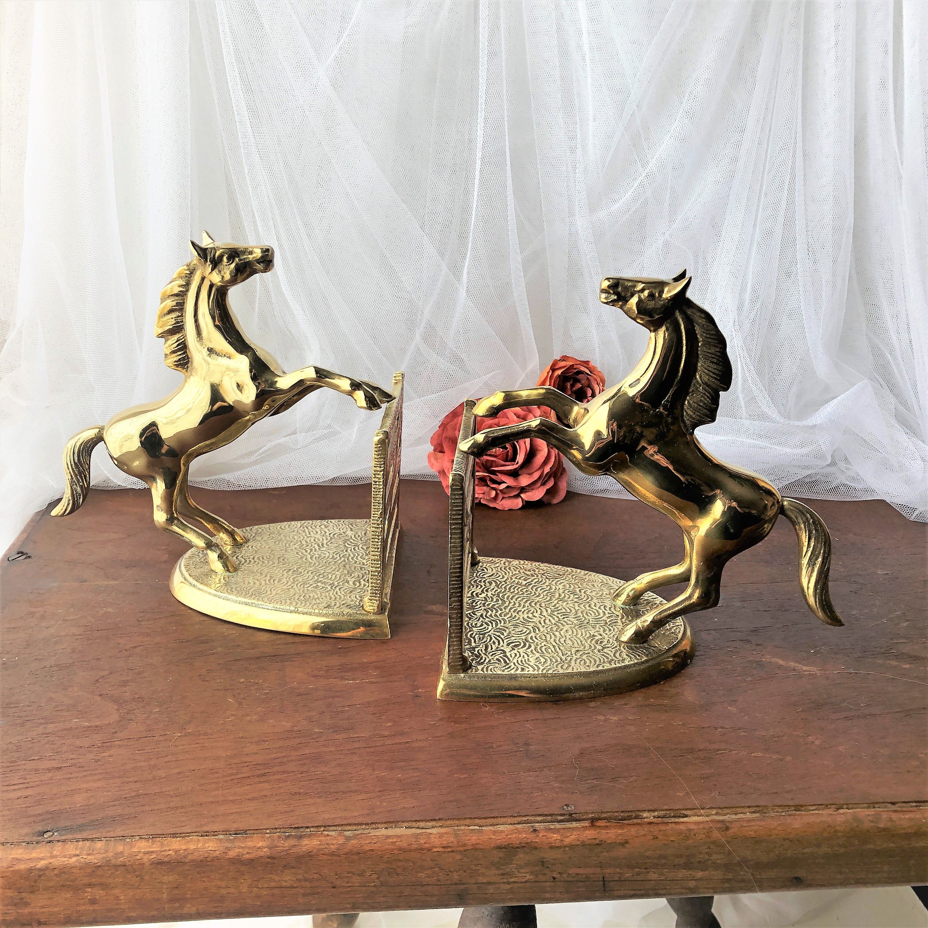Goldeneye brass décor horses