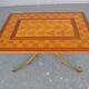 Table low wood and gilded wrought iron style 1940