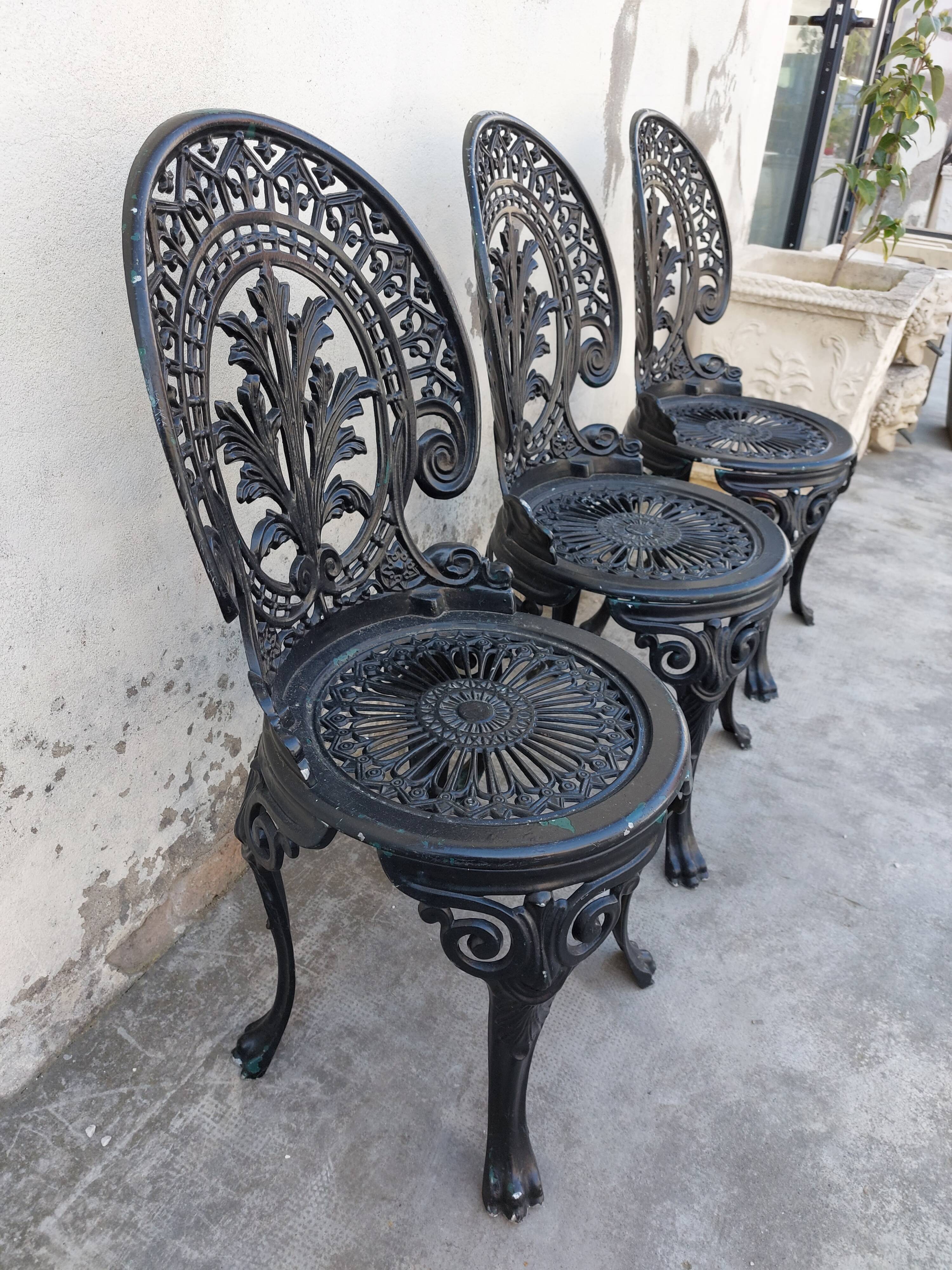 Series of 3 antique garden chairs