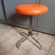 Vintage 70's rotating stool, chrome base, orange imitation leather seat
