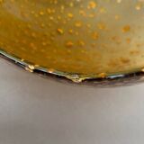 Large amber globe with glittery bubbles