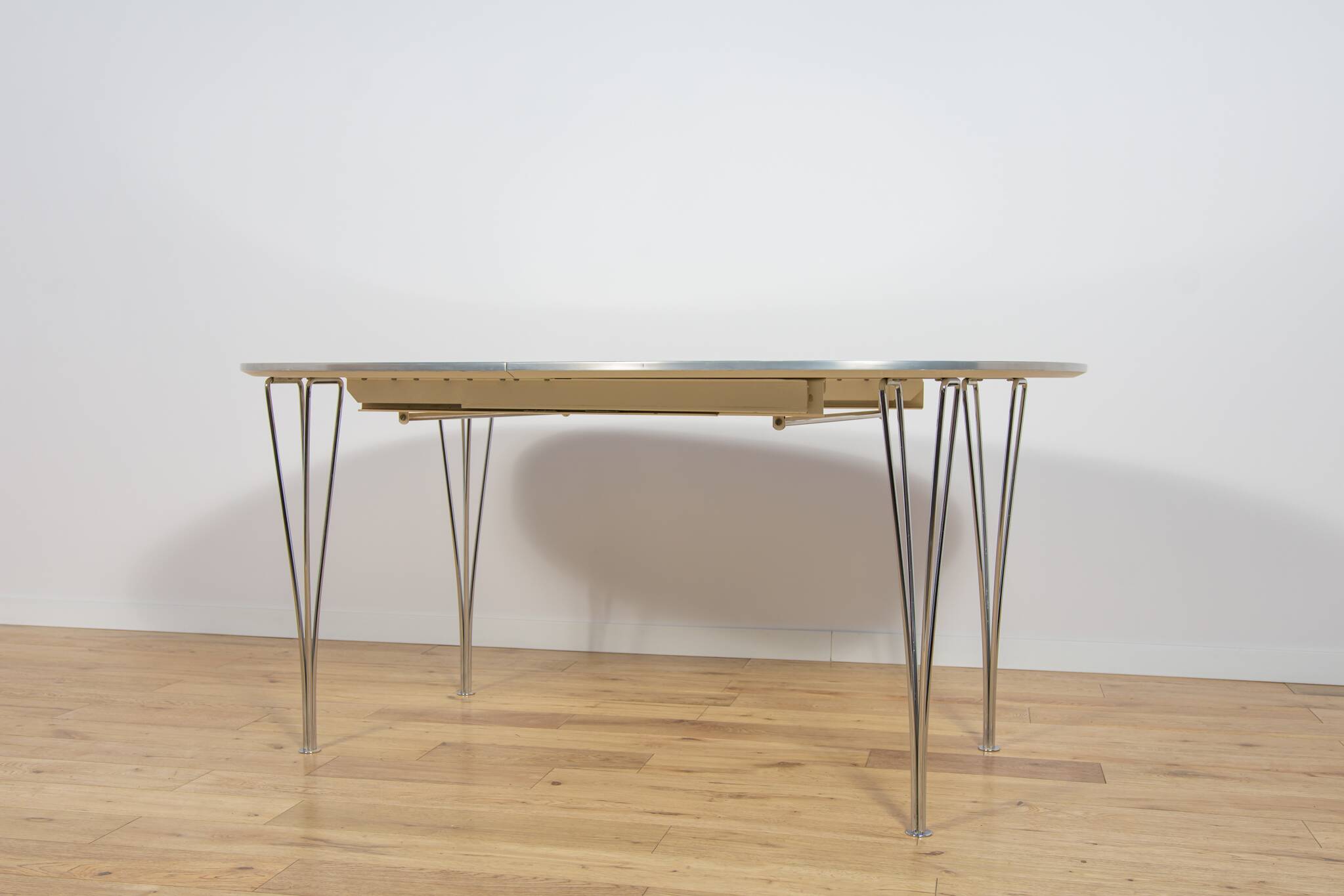 Mid Century Modern Extendable Ellipse B612 Dining Table by Piet Hein & Brun
