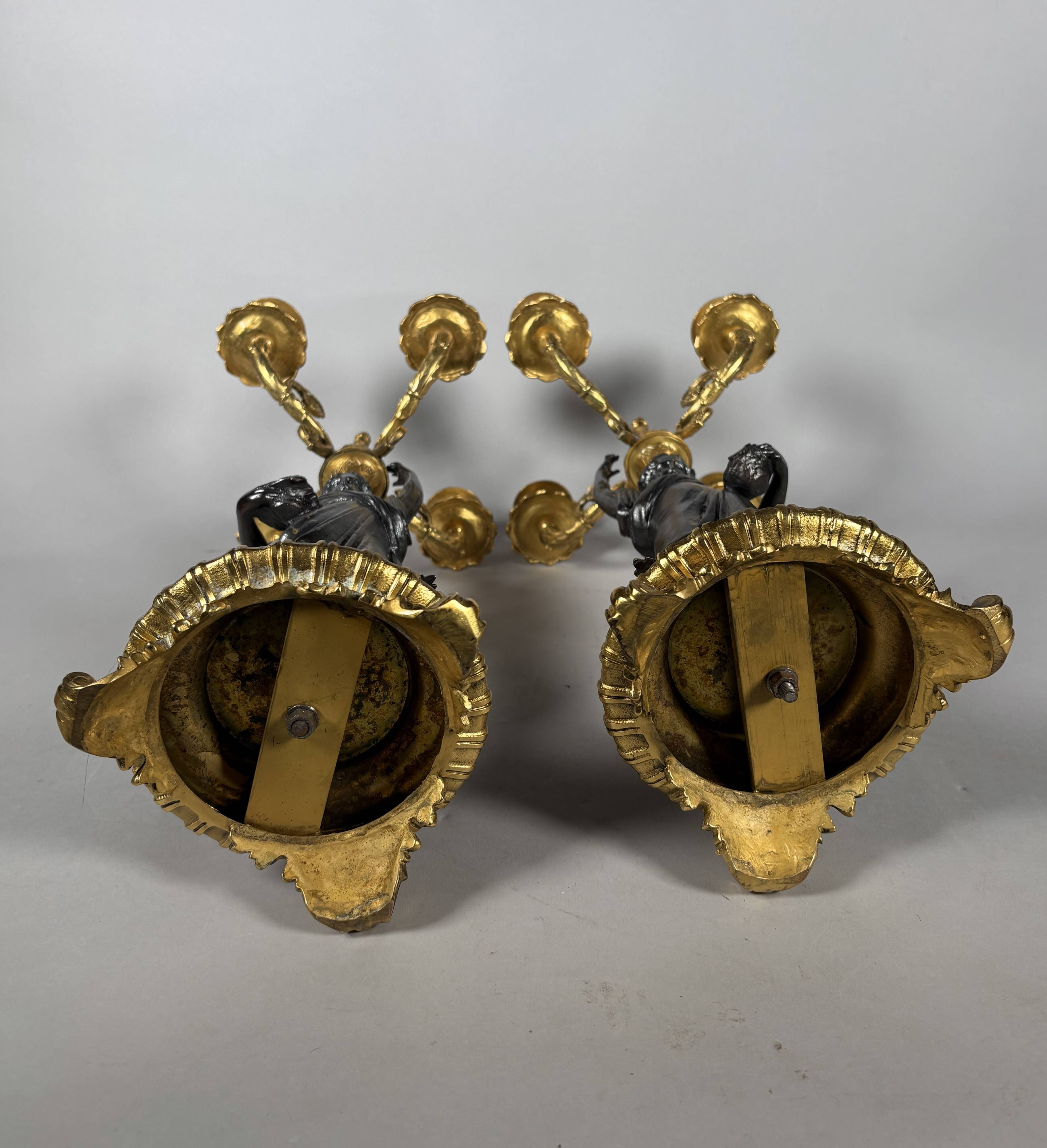 Pair of candelabra with women in the antique style of Napoleon III.