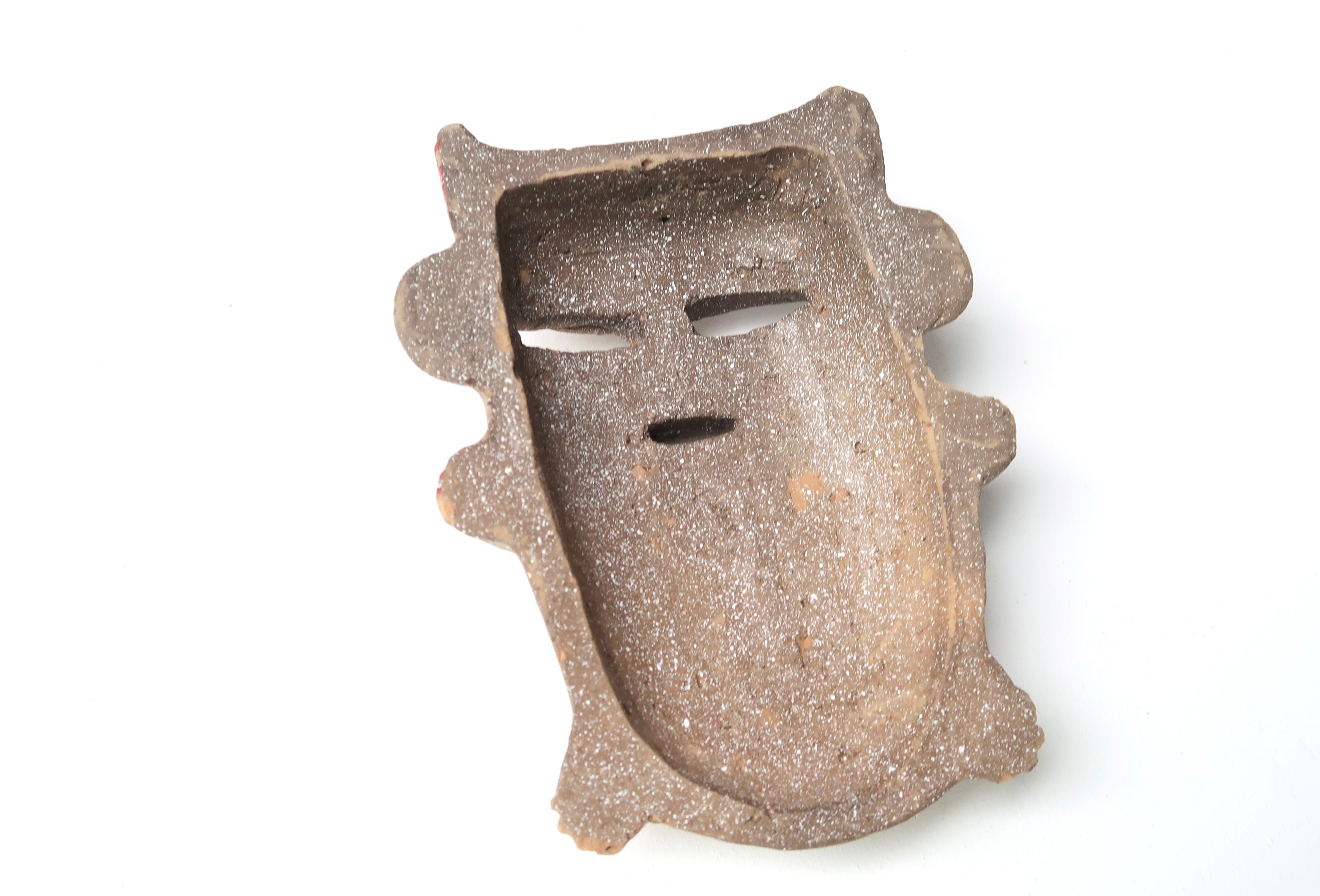 Anthropomorphic ceramic wall decoration, South America