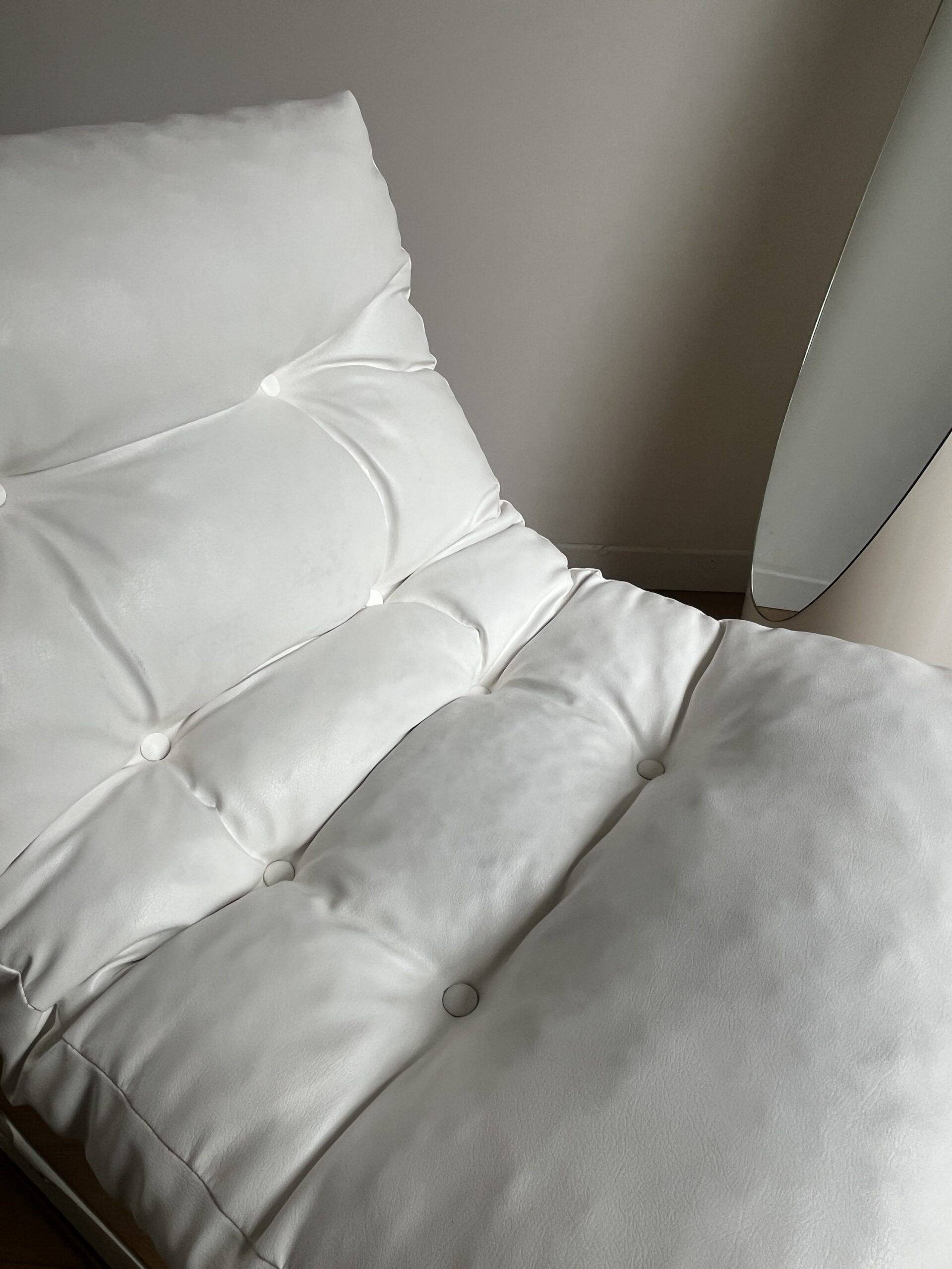 White faux leather armchair by Christian Koban for DOM edition