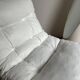 White faux leather armchair by Christian Koban for DOM edition