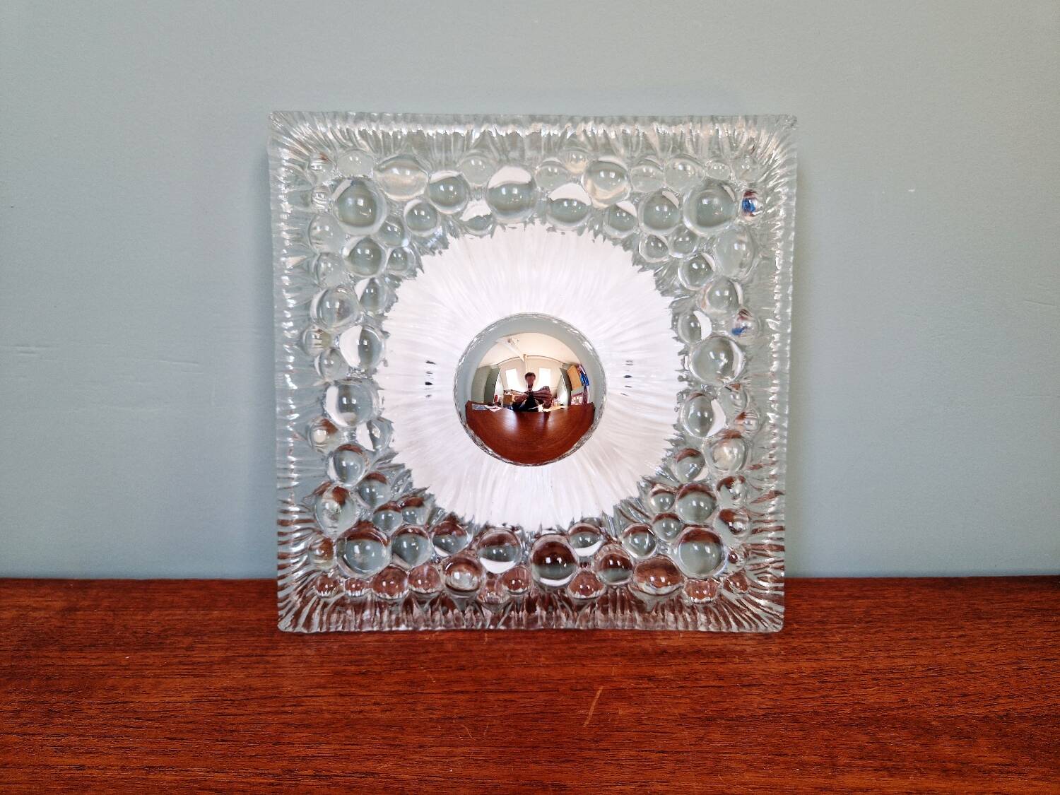 Space Age wall light in pressed transparent moulded glass, 1970.
