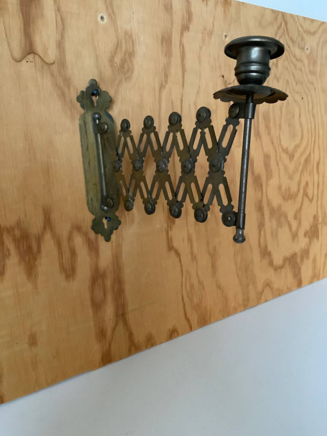 Accordion brass candle holder