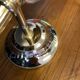 Pair of brass and opaline wall lamps
