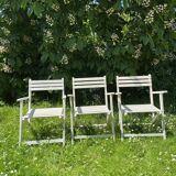 Folding slatted garden armchairs