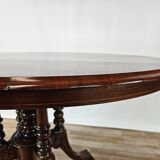 Coffee table in walnut with maple inlays and wheels