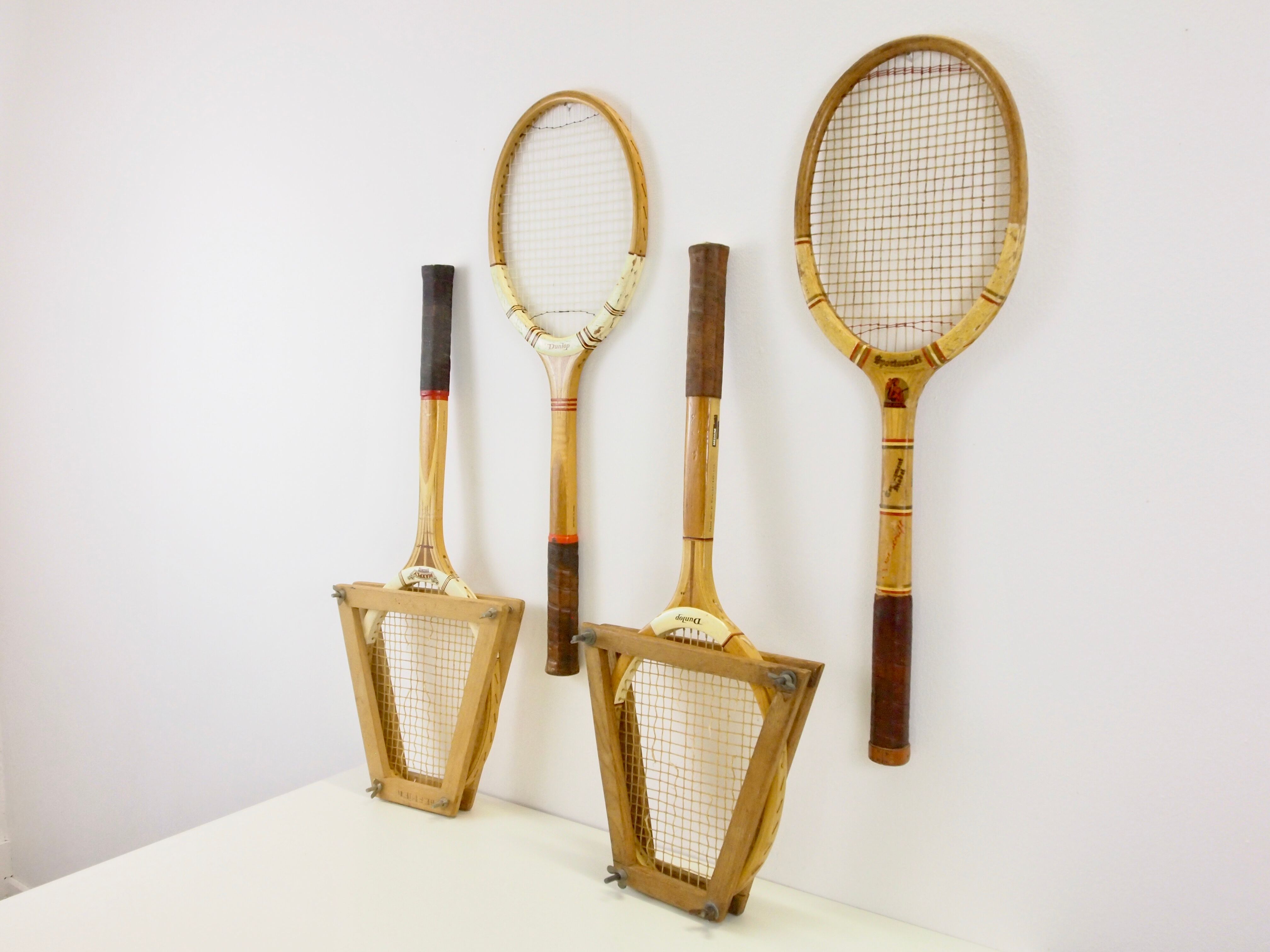 Set of 4 vintage wooden tennis rackets