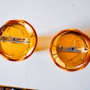 Pair of "cocoon" wall lights, pear shape, resin and pine, Italy, 1970