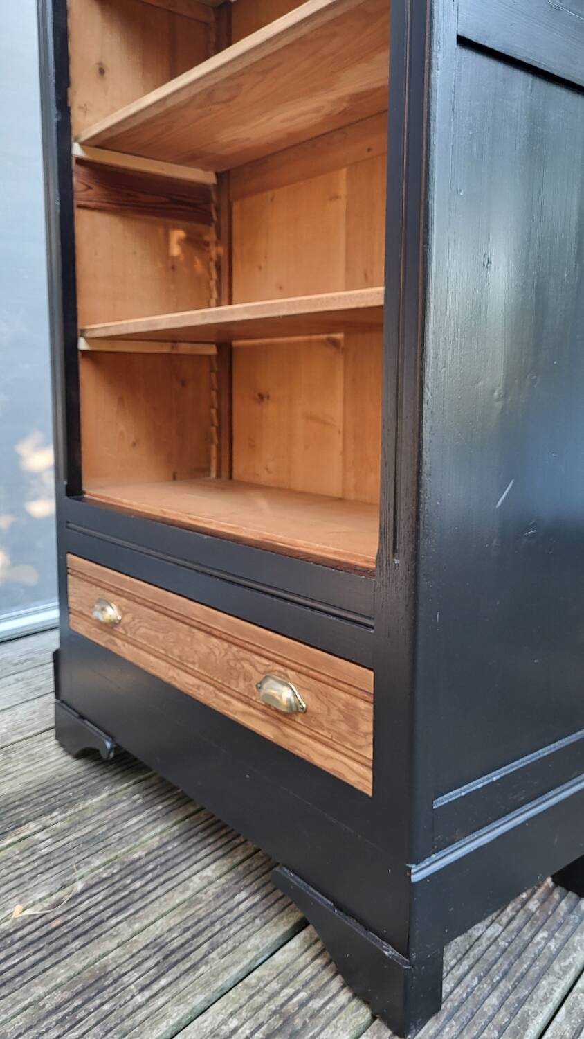 Two-tone black and honey bookcase