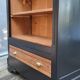 Two-tone black and honey bookcase
