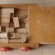 Old raw wood construction game in its cart