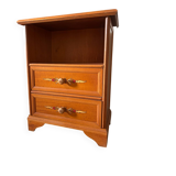 Vintage bedside table with floral decor