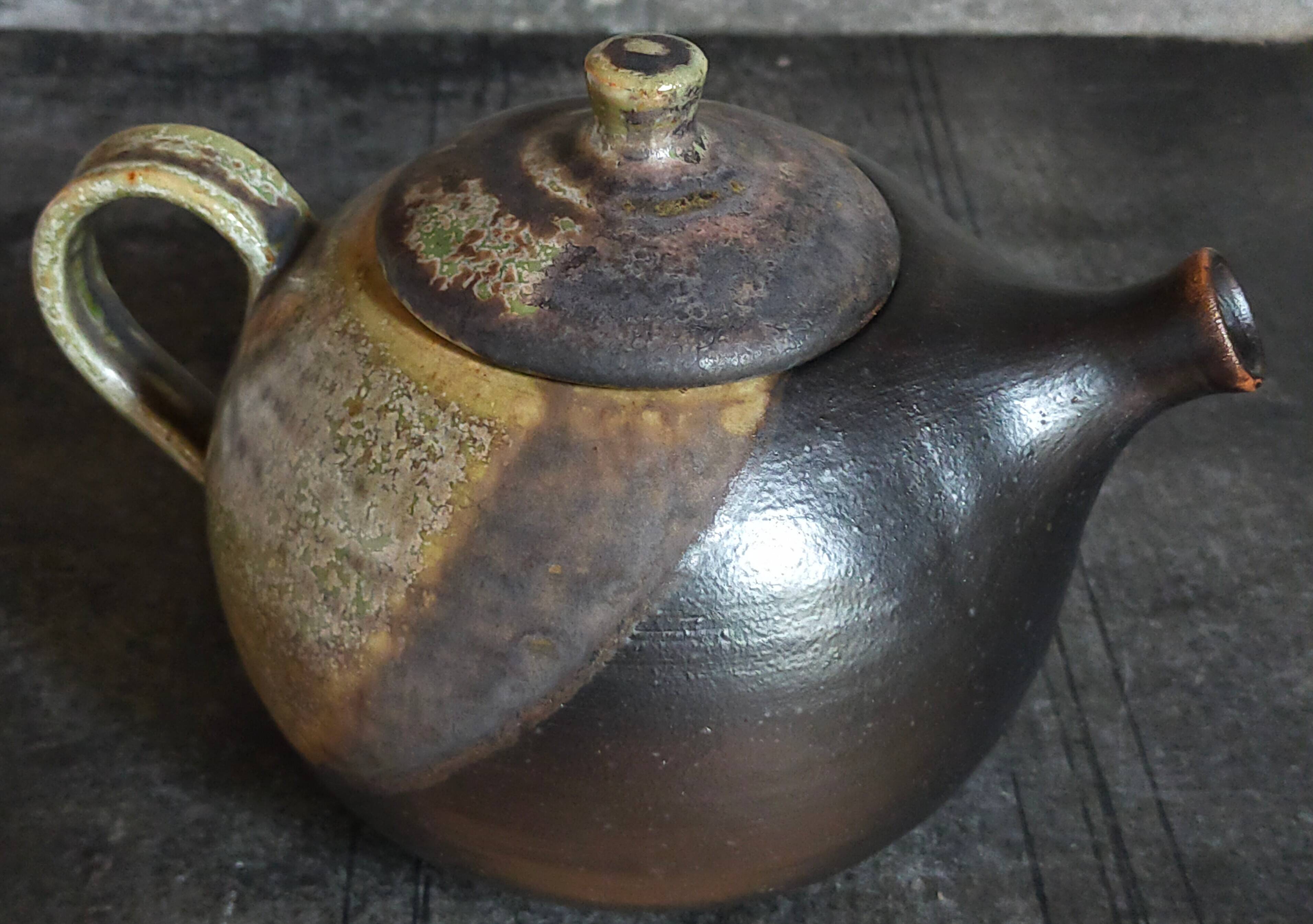 Vintage enameled stoneware potter's teapot