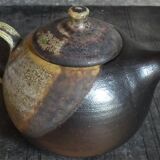 Vintage enameled stoneware potter's teapot