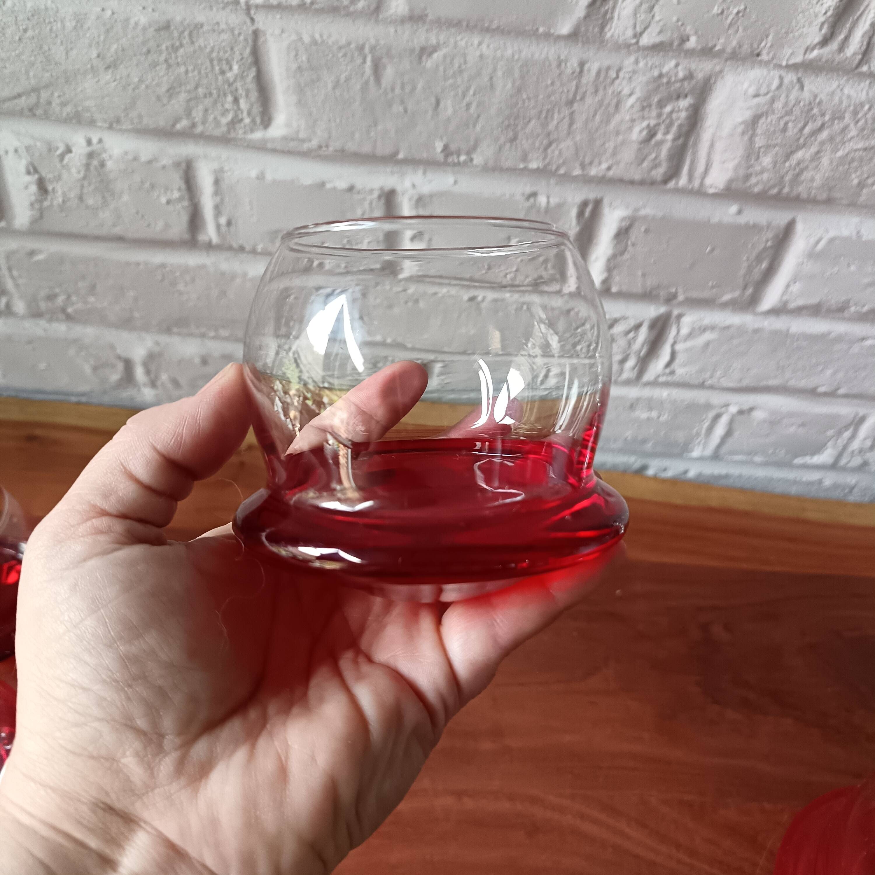 Vintage red designer glasses and carafe set, tumbler glass base