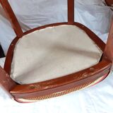 2 varnished solid wood chairs with "ethnic" padding