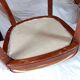 2 varnished solid wood chairs with "ethnic" padding