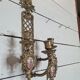 Bronze wall candle holder