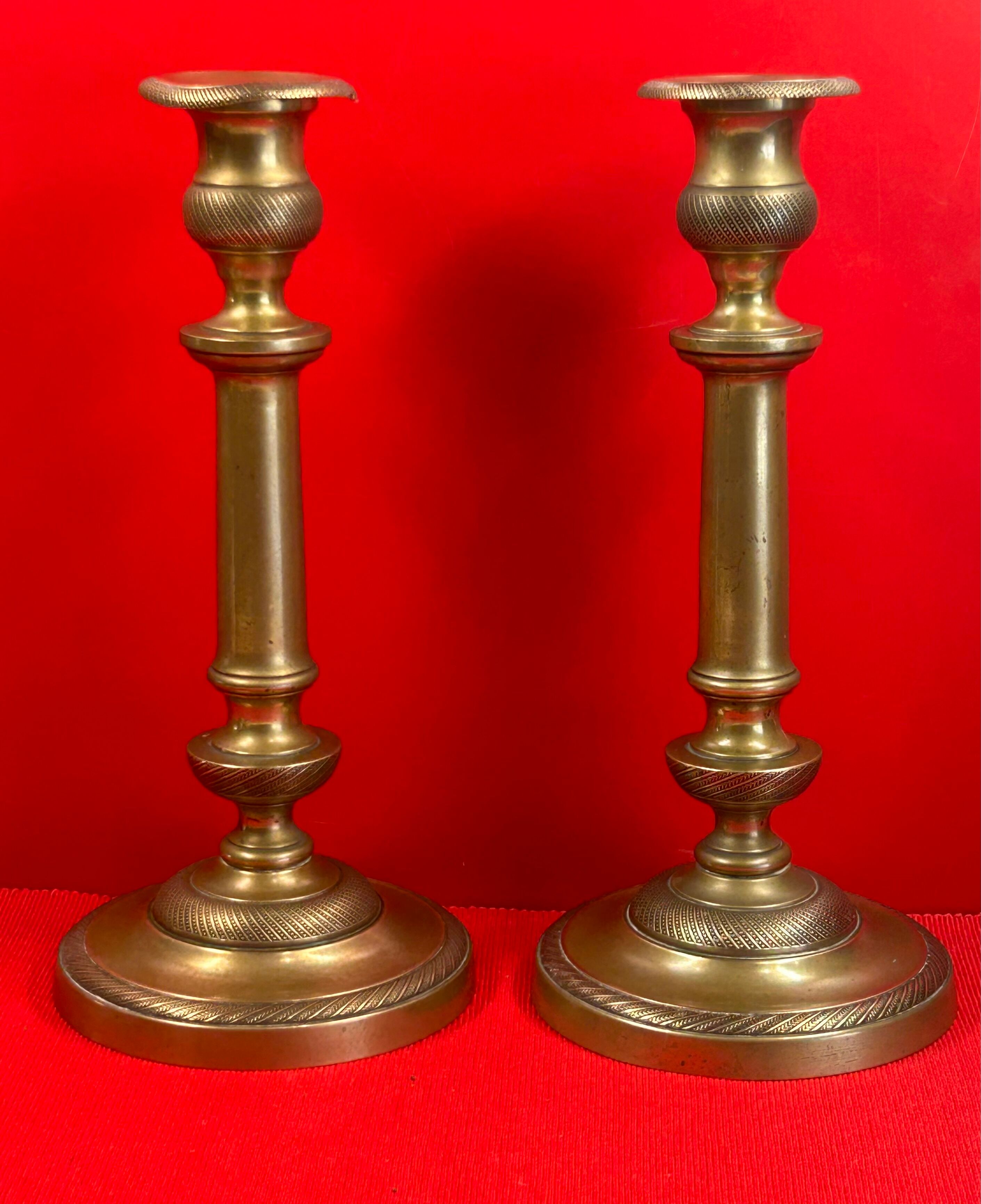Pair of 19th-century restoration candlesticks in guilloché bronze - H 27 cm