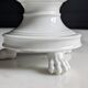 White porcelain confiturier with lion paws and masks. 19th century.