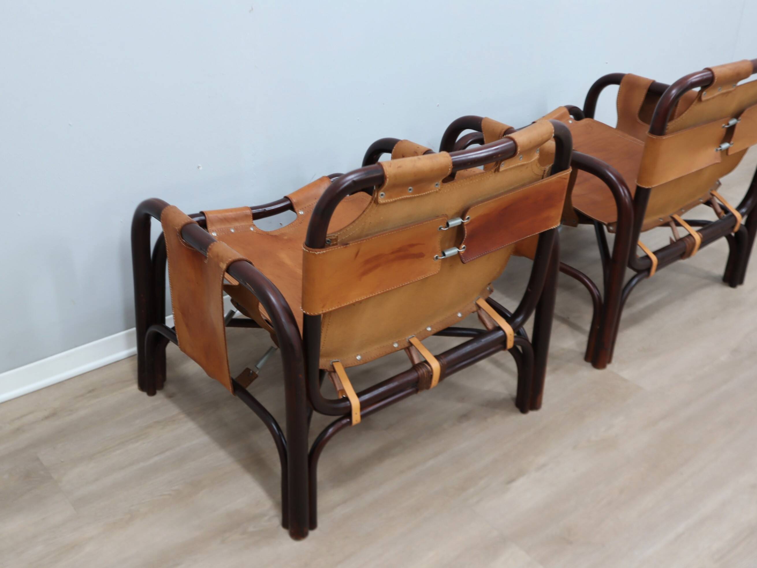 A vintage Tito Agnoli armchair leather and bamboo 1960s