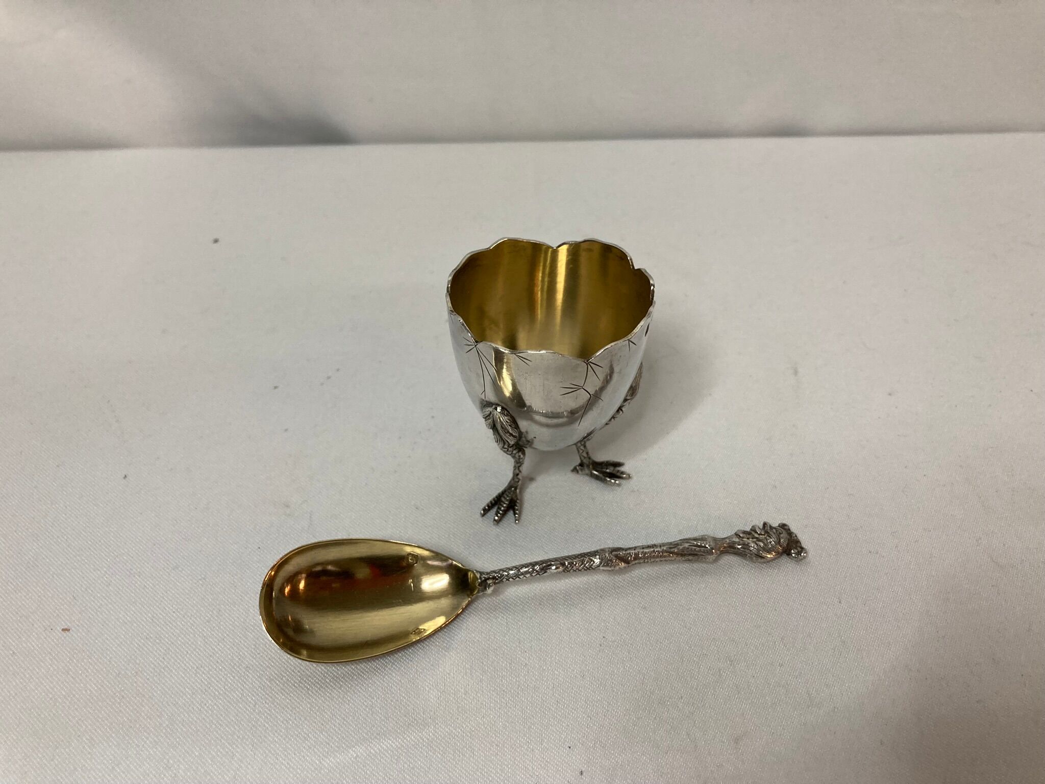 Eggcup feet and silver spoon punches early twentieth century