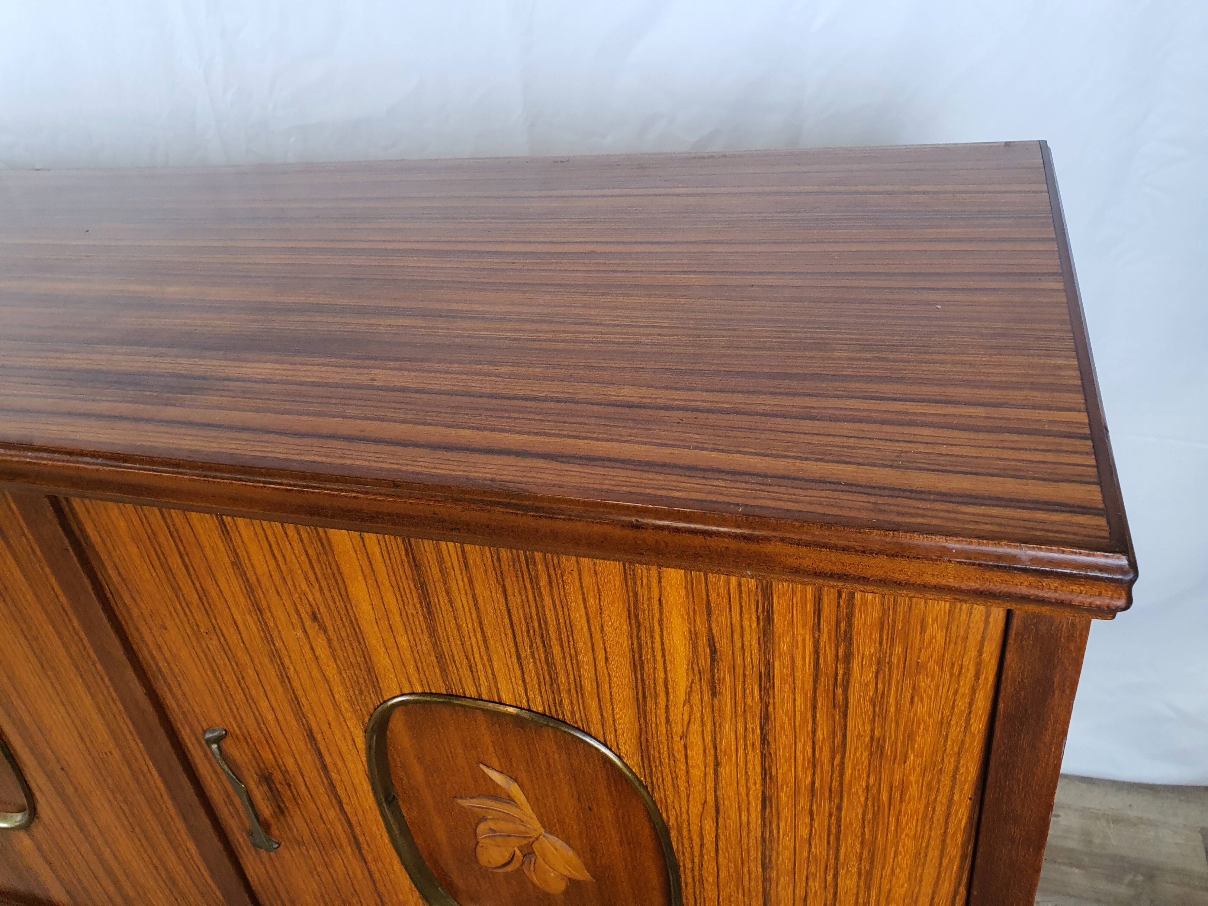 1960s sideboard with decorated doors in wood and brass