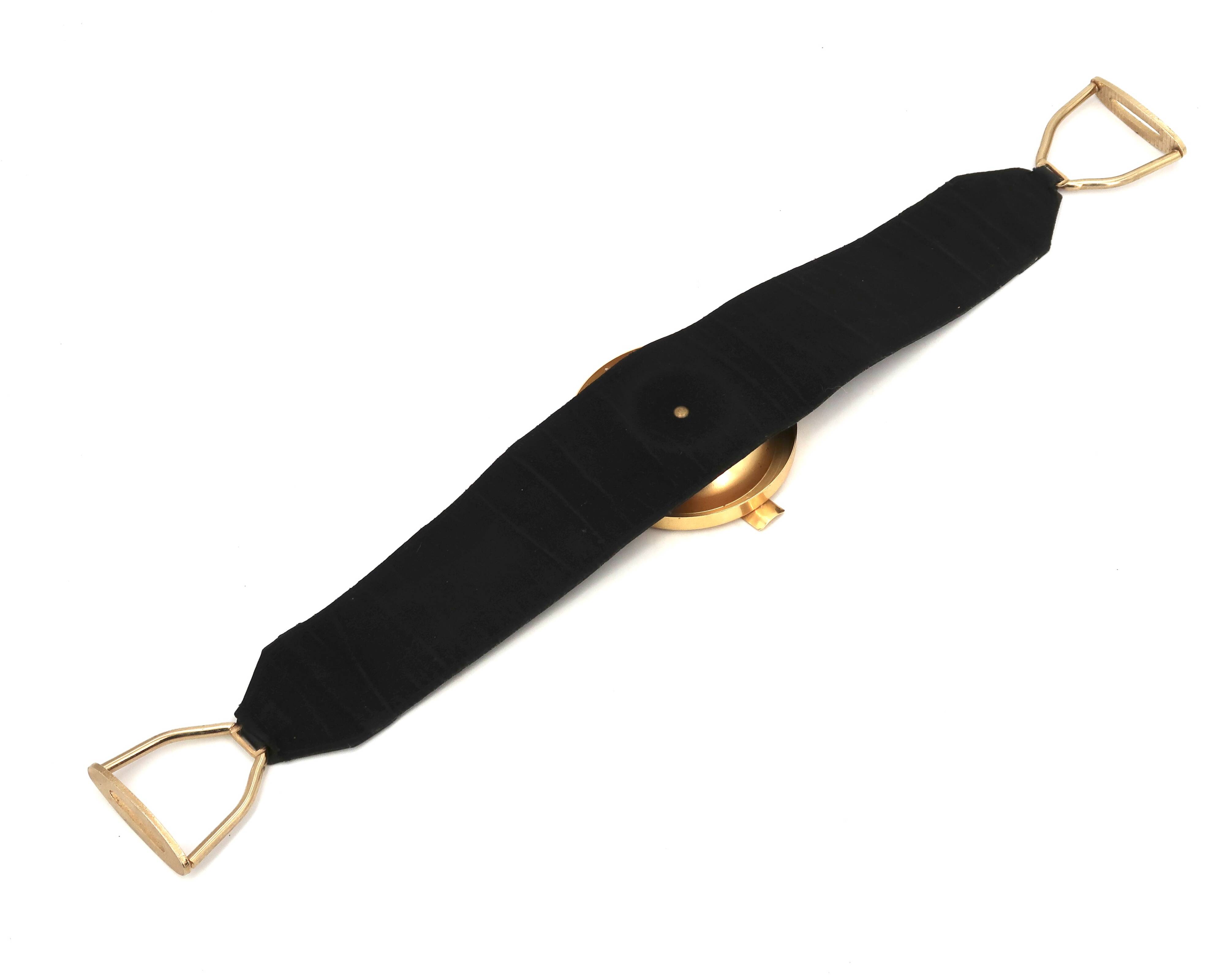 Golden metal armrest ashtray with faux leather and stirrups, 1950s.