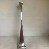 Large silver metal candlestick in the style of Xavier Lust